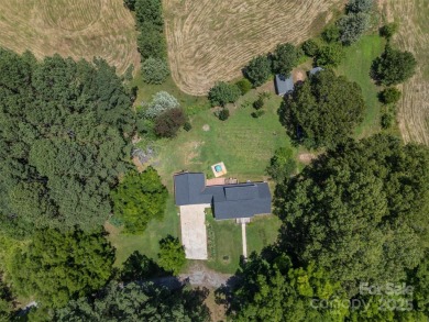You don't want to miss this one!  It is a four bedroom two bath on Meadowbrook Golf Course in North Carolina - for sale on GolfHomes.com, golf home, golf lot