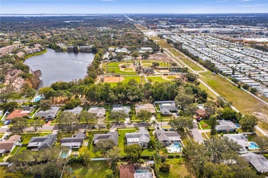 An exceptional opportunity to own a residence in prime on Countryside Country Club in Florida - for sale on GolfHomes.com, golf home, golf lot