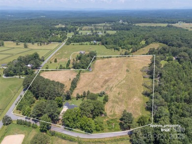 You don't want to miss this one!  It is a four bedroom two bath on Meadowbrook Golf Course in North Carolina - for sale on GolfHomes.com, golf home, golf lot