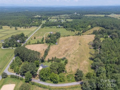You don't want to miss this one!  It is a four bedroom two bath on Meadowbrook Golf Course in North Carolina - for sale on GolfHomes.com, golf home, golf lot
