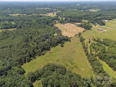 You don't want to miss this one!  It is a four bedroom two bath on Meadowbrook Golf Course in North Carolina - for sale on GolfHomes.com, golf home, golf lot