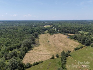 You don't want to miss this one!  It is a four bedroom two bath on Meadowbrook Golf Course in North Carolina - for sale on GolfHomes.com, golf home, golf lot
