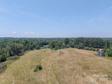 You don't want to miss this one!  It is a four bedroom two bath on Meadowbrook Golf Course in North Carolina - for sale on GolfHomes.com, golf home, golf lot