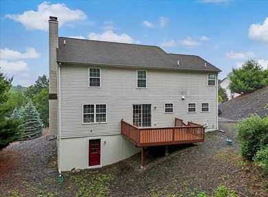 REDUCED!! Discover this beautifully maintained 4-bedroom, 3-bath on Country Club of the Poconos Golf Course in Pennsylvania - for sale on GolfHomes.com, golf home, golf lot