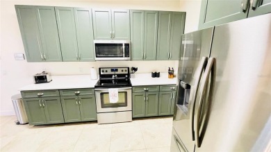 Stunning and completely remodeled fully furnished 4-bedroom on Highlands Reserve Golf Club in Florida - for sale on GolfHomes.com, golf home, golf lot
