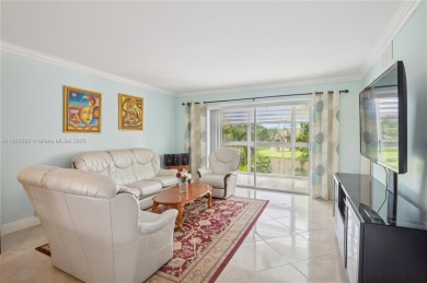 Beautiful 2 bed /2 bath condo with peaceful water views  from on Sunrise Lakes Phase III in Florida - for sale on GolfHomes.com, golf home, golf lot