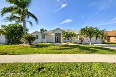 This exquisite waterfront home w/ gas heated; saltwater pool on Savannahs Golf Club in Florida - for sale on GolfHomes.com, golf home, golf lot