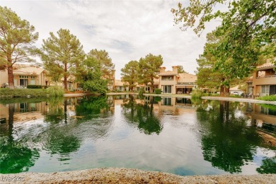 STUNNING WATERFRONT LOCATION. RARE END UNT FOR THIS MODEL WITH on Spanish Trail Golf and Country Club in Nevada - for sale on GolfHomes.com, golf home, golf lot