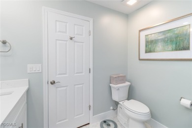 Welcome to this charming home in the sought-after gated on Herons Glen Golf and Country Club in Florida - for sale on GolfHomes.com, golf home, golf lot