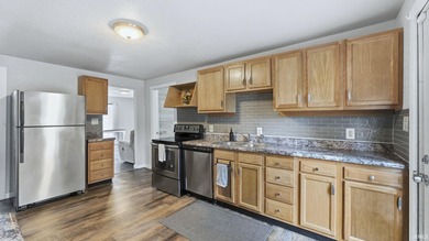 So cute inside and out!   This three bedroom, two bath home has on Elks Country Club in Indiana - for sale on GolfHomes.com, golf home, golf lot