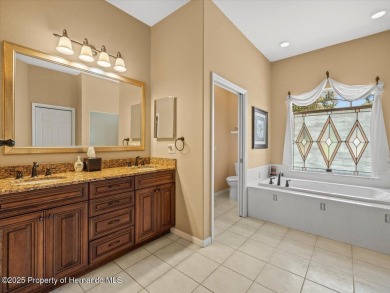 Location, location, location! This 1996 Lindhorst built Custom on Glen Lakes Country Club in Florida - for sale on GolfHomes.com, golf home, golf lot