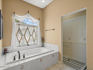 Location, location, location! This 1996 Lindhorst built Custom on Glen Lakes Country Club in Florida - for sale on GolfHomes.com, golf home, golf lot