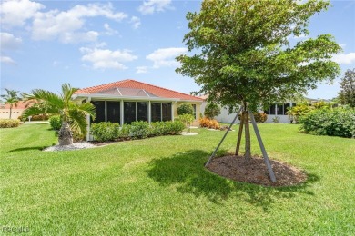 Welcome to this charming home in the sought-after gated on Herons Glen Golf and Country Club in Florida - for sale on GolfHomes.com, golf home, golf lot