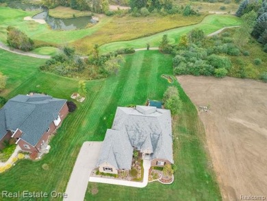 Pride-of-ownership is an UNDERSTATEMENT with this Vitale on Copper Hills Golf and Country Club in Michigan - for sale on GolfHomes.com, golf home, golf lot