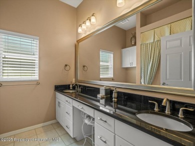 Location, location, location! This 1996 Lindhorst built Custom on Glen Lakes Country Club in Florida - for sale on GolfHomes.com, golf home, golf lot