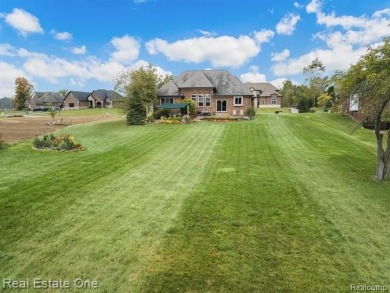 Pride-of-ownership is an UNDERSTATEMENT with this Vitale on Copper Hills Golf and Country Club in Michigan - for sale on GolfHomes.com, golf home, golf lot