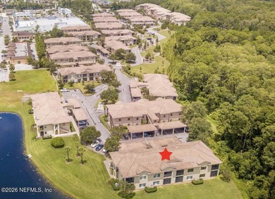 The POND view of this ground-floor condo will WOW you! Only two on The Palencia Club in Florida - for sale on GolfHomes.com, golf home, golf lot