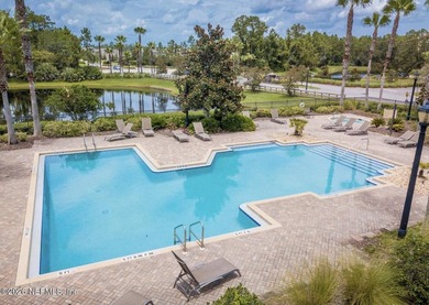 The POND view of this ground-floor condo will WOW you! Only two on The Palencia Club in Florida - for sale on GolfHomes.com, golf home, golf lot