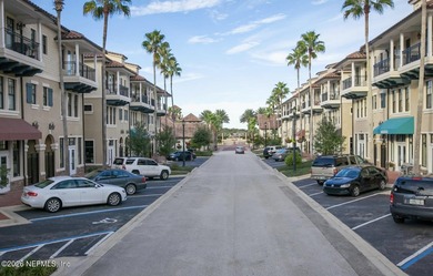 The POND view of this ground-floor condo will WOW you! Only two on The Palencia Club in Florida - for sale on GolfHomes.com, golf home, golf lot