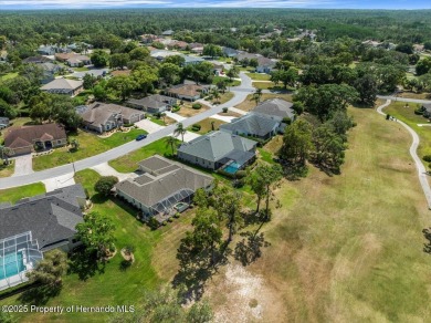 Located in Glen Lakes, this 1996 Lindhorst built Custom on Glen Lakes Country Club in Florida - for sale on GolfHomes.com, golf home, golf lot