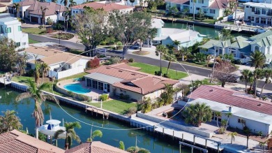 Situated in a desirable waterfront location on south Longboat on Links on Longboat Golf Club in Florida - for sale on GolfHomes.com, golf home, golf lot