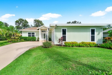 Discover modern luxury in this fully renovated 3-bedroom, 3-bath on Eastpointe Country Club in Florida - for sale on GolfHomes.com, golf home, golf lot