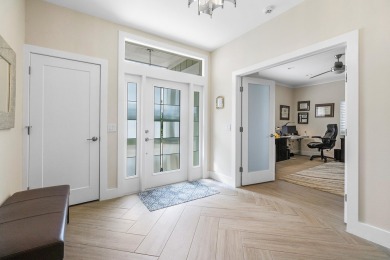 Discover modern luxury in this fully renovated 3-bedroom, 3-bath on Eastpointe Country Club in Florida - for sale on GolfHomes.com, golf home, golf lot