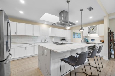 Discover modern luxury in this fully renovated 3-bedroom, 3-bath on Eastpointe Country Club in Florida - for sale on GolfHomes.com, golf home, golf lot