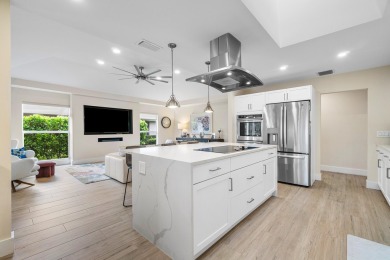 Discover modern luxury in this fully renovated 3-bedroom, 3-bath on Eastpointe Country Club in Florida - for sale on GolfHomes.com, golf home, golf lot