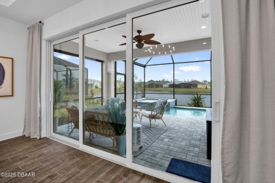 Fabulous Waterfront FURNISHED TORTOLA Villa with a heated salt on LPGA International Golf Course in Florida - for sale on GolfHomes.com, golf home, golf lot
