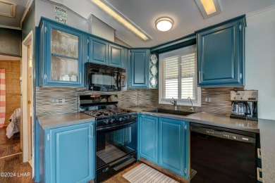 On leased land - Lakeview Escape - Fully Furnished, Steps from on London Bridge Golf Course in Arizona - for sale on GolfHomes.com, golf home, golf lot