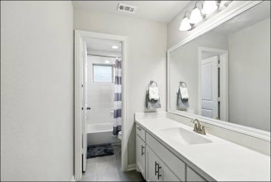 Luxurious 5-Bedroom Retreat in The Tribute - Style, Space on The Tribute At the Colony in Texas - for sale on GolfHomes.com, golf home, golf lot
