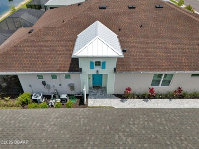Fabulous Waterfront FURNISHED TORTOLA Villa with a heated salt on LPGA International Golf Course in Florida - for sale on GolfHomes.com, golf home, golf lot