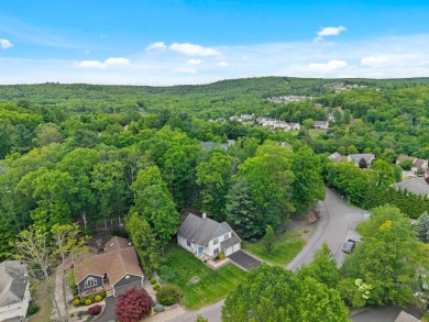 This impeccably maintained 3-bedroom, 4-bathroom contemporary on Country Club of the Poconos Golf Course in Pennsylvania - for sale on GolfHomes.com, golf home, golf lot