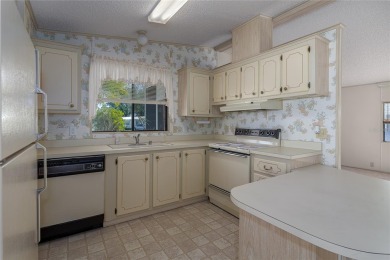 Seller Motivated! Welcome to this charming 2-bedroom, 2-bathroom on Imperial Lakewoods Golf Club in Florida - for sale on GolfHomes.com, golf home, golf lot