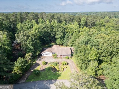 Year-round big water views of Jackson Lake!! This 3-bedroom & 2 on Turtle Cove Golf Course in Georgia - for sale on GolfHomes.com, golf home, golf lot