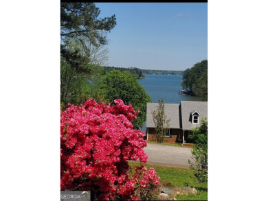 Year-round big water views of Jackson Lake!! This 3-bedroom & 2 on Turtle Cove Golf Course in Georgia - for sale on GolfHomes.com, golf home, golf lot