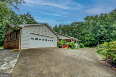 Year-round big water views of Jackson Lake!! This 3-bedroom & 2 on Turtle Cove Golf Course in Georgia - for sale on GolfHomes.com, golf home, golf lot