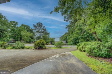 Year-round big water views of Jackson Lake!! This 3-bedroom & 2 on Turtle Cove Golf Course in Georgia - for sale on GolfHomes.com, golf home, golf lot