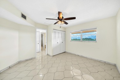 Enjoy stunning golf views from this beautifully maintained on Poinciana Golf Club in Florida - for sale on GolfHomes.com, golf home, golf lot