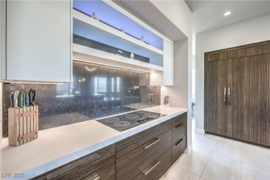 Experience elevated living in this stunning 3-story modern on Dragon Ridge Country Club in Nevada - for sale on GolfHomes.com, golf home, golf lot
