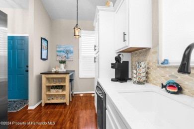 Check Out this Attached Villa with Extra Large Yard in the on Silverthorn Country Club in Florida - for sale on GolfHomes.com, golf home, golf lot