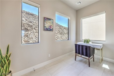 Experience elevated living in this stunning 3-story modern on Dragon Ridge Country Club in Nevada - for sale on GolfHomes.com, golf home, golf lot