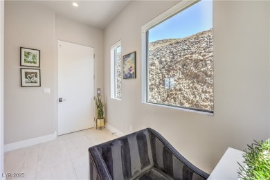 Experience elevated living in this stunning 3-story modern on Dragon Ridge Country Club in Nevada - for sale on GolfHomes.com, golf home, golf lot