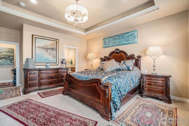 This stunning custom home is nestled at the end of a serene on Highland Meadows Golf Course in Colorado - for sale on GolfHomes.com, golf home, golf lot
