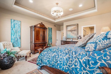 This stunning custom home is nestled at the end of a serene on Highland Meadows Golf Course in Colorado - for sale on GolfHomes.com, golf home, golf lot