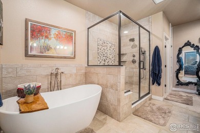 This stunning custom home is nestled at the end of a serene on Highland Meadows Golf Course in Colorado - for sale on GolfHomes.com, golf home, golf lot