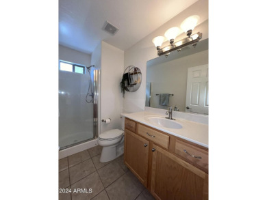 TURNKEY SINGLE-STORY, end unit townhome next to open area and on Antelope Hills Golf Courses in Arizona - for sale on GolfHomes.com, golf home, golf lot