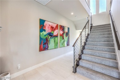 Experience elevated living in this stunning 3-story modern on Dragon Ridge Country Club in Nevada - for sale on GolfHomes.com, golf home, golf lot