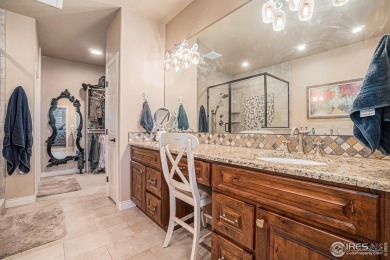 This stunning custom home is nestled at the end of a serene on Highland Meadows Golf Course in Colorado - for sale on GolfHomes.com, golf home, golf lot